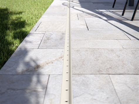 Stormtech slot drain  Supplied by Slim Line Drain, the Stormtech designed and manufactured range of stainless steel slot drains, linear grates and drainage supplies are ideal for indoor drainage and outdoor stormwater and surface water removal needs